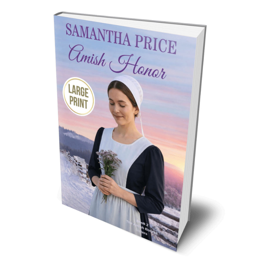 A large-format paperback book titled "Amish Honor" by Samantha Price, shown at an angle on a white background. The cover features a woman in an Amish outfit holding a bouquet of flowers against a snowy landscape at sunset.