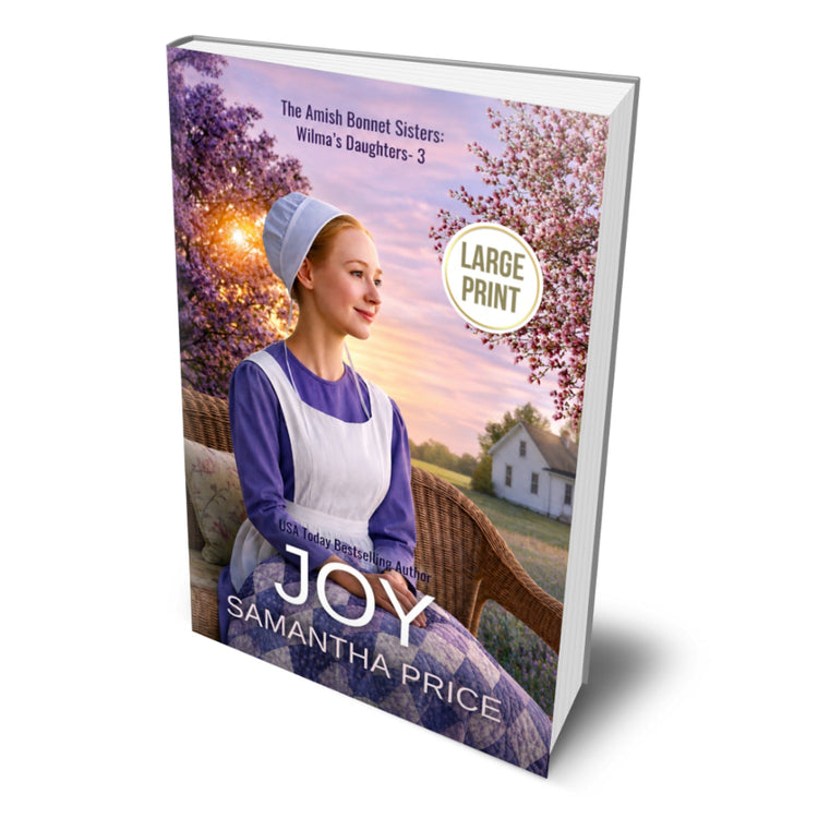 Joy large print amish book. cover with an amish woman in a purple dress in a field.