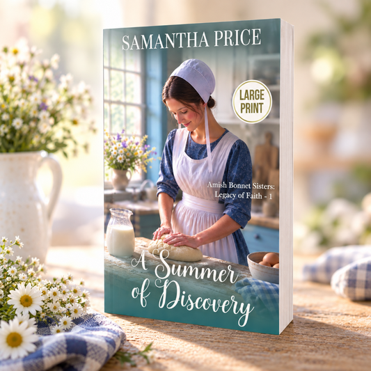 A large print paperback book titled 'A Summer of Discovery' by Samantha Price, standing upright on a wooden table. The book cover features a vintage-style photograph of an Amish woman kneading dough in a sunlit kitchen.